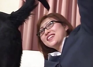 Asian girl is sucking her lovely doggy