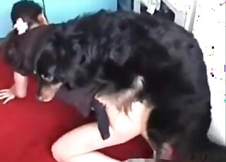 MILF bitch swallows up a nice-looking dog penis